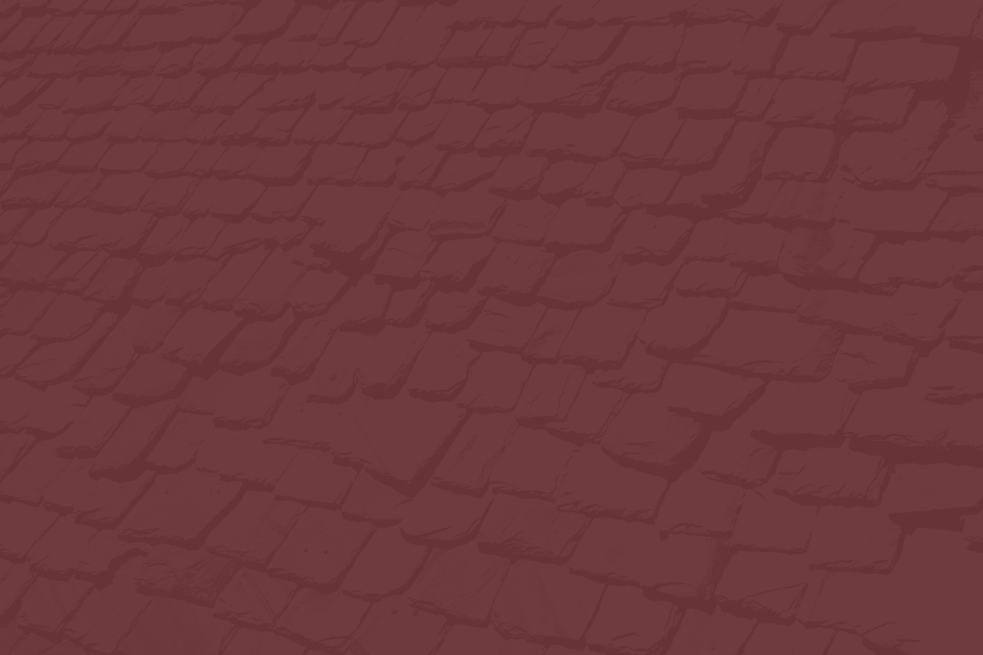 A red-tinted image of a slate roof pattern.